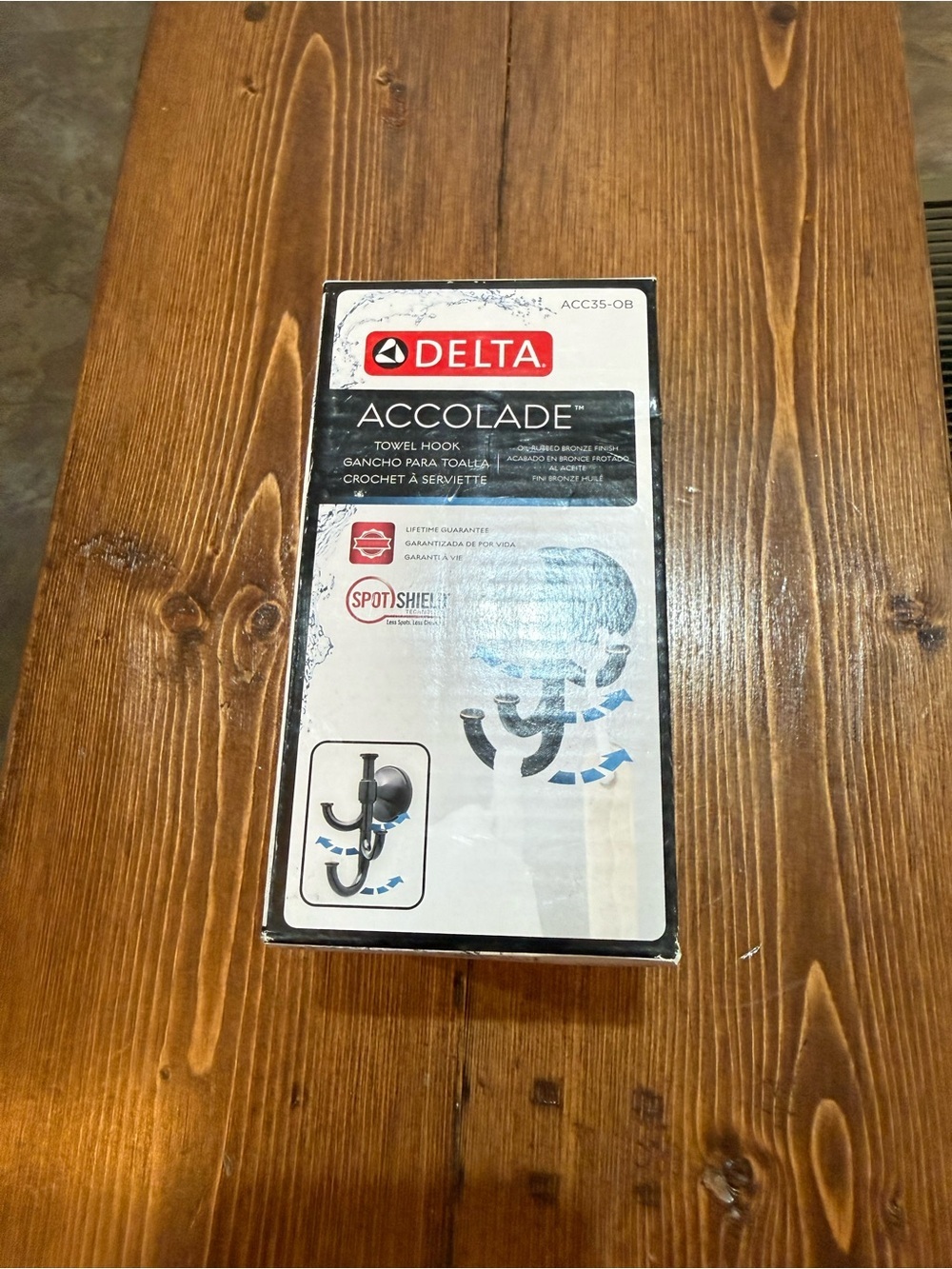 Delta Accolade Towel Hook in Black and White Packaging